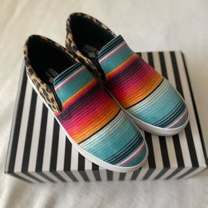 Crazy train cheetah print and bright stripes shoes.